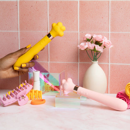 PikaVibe Magic Wand Vibrator hand held above bathroom counter
